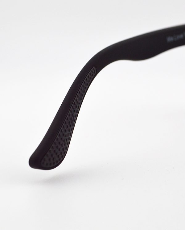 Close-up of the RKT Brodie sunglasses temple tip with textured grip.